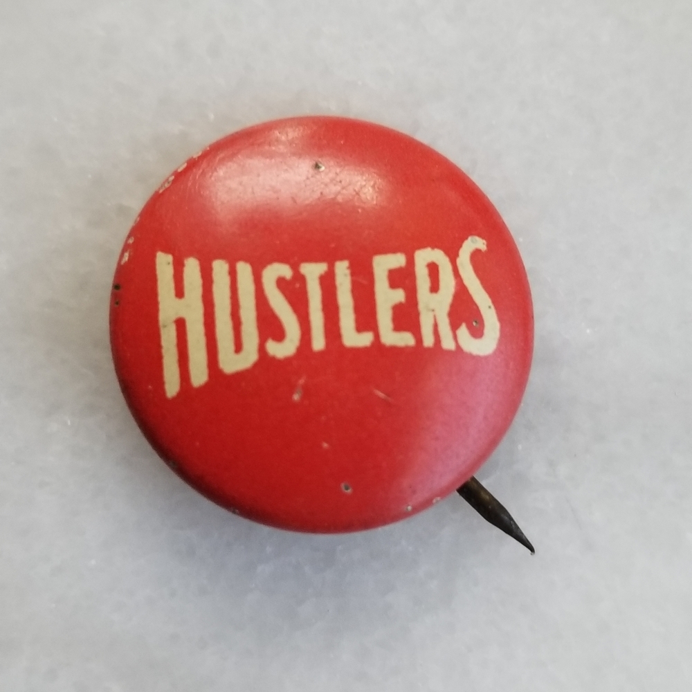 Vintage hustlers button
